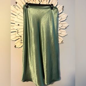 Satin like green midi skirt